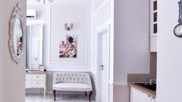 Standard Studio, Courtyard View | Living area | 120-cm Smart TV with cable channels, pay films