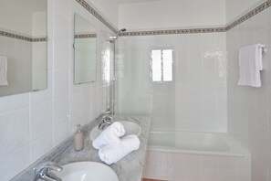 Hair dryer, towels, soap, toilet paper