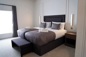 Tomannsrom | Sengetøy av topp kvalitet, safe på rommet og strykejern/-brett