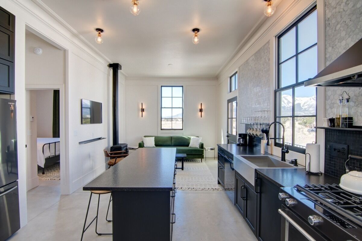 This 2 bedroom, 1 bathroom modern loft 2nd floor apartment sleeps up to 4 guests