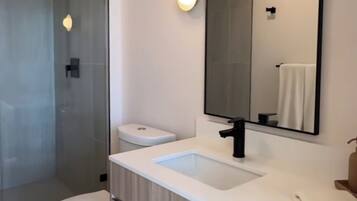 Shower, hair dryer, towels, soap