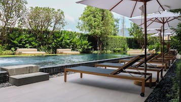 Outdoor pool, pool umbrellas, pool loungers