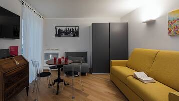 Appartement | Coin séjour | Télévision de 35 cm avec chaînes numériques