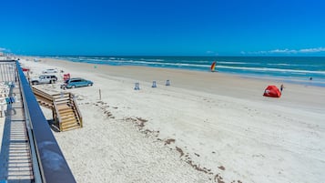 On the beach, sun loungers, beach towels
