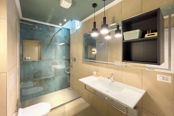 Family Quadruple Room, Non Smoking, City View | Bathroom | Hair dryer, towels, soap, shampoo