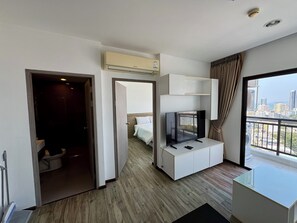 Condo, 1 Bedroom, Balcony, Sea View | Living area - Treetops Condominium by PSR (Pattaya)