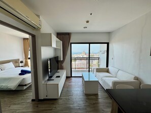 Condo, 1 Bedroom, Balcony, Sea View | Living area