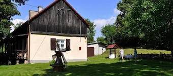 Holiday home with fireplace and private garden