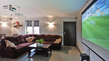 Smart TV, fireplace, DVD player, foosball