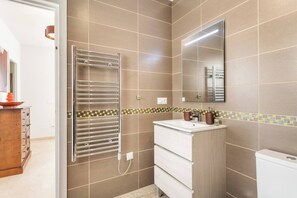 Hair dryer, towels, soap, toilet paper