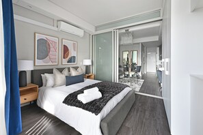 1 bedroom, desk, iron/ironing board, bed sheets