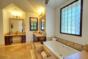 Shower, hair dryer, towels, shampoo