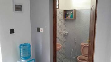 Shower, bidet, towels, soap