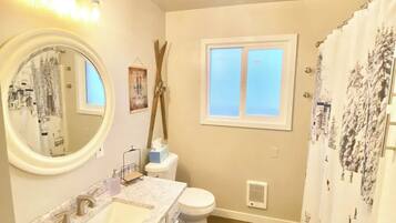 Hair dryer, towels, soap, shampoo