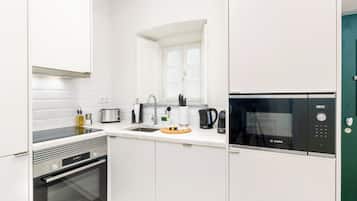 Departamento, 1 habitación | Cocina privada | Refrigerador, microondas, horno y parrilla de estufa