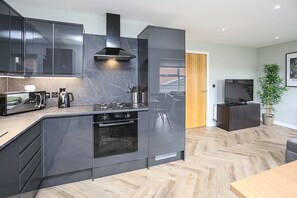 Fridge, microwave, oven, coffee/tea maker