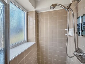 Shower, hair dryer, towels, soap