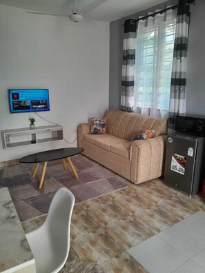 Comfort Apartment, 1 Queen Bed, Private Bathroom | Living area - Kelly Homes (Kilifi)