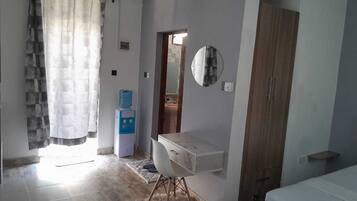 Departamento Confort, 1 cama Queen size, baño privado | 1 habitación, tabla de planchar con plancha y wifi gratis