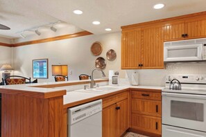 Fridge, microwave, oven, stovetop - The Charter at Beaver Creek C0405 (Beaver Creek)