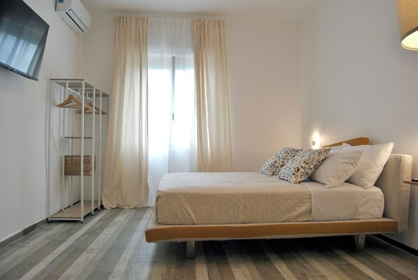 Deluxe kamer, uitzicht op de stad | Gratis wifi, beddengoed