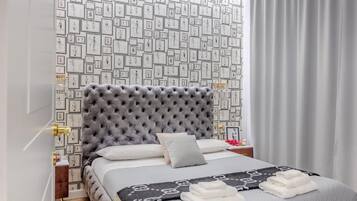 Appartamento familiare, 2 camere da letto, angolo cottura, vista mare parziale | Una cassaforte in camera, tende oscuranti, Wi-Fi gratuito