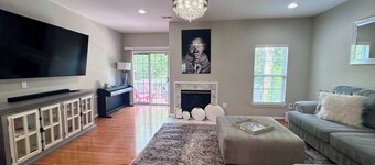Contemporary Town-home with free parking at premises!