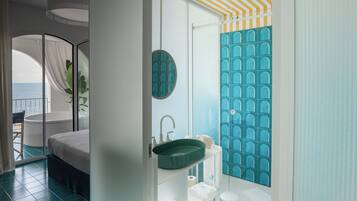 Deluxe Room, Hot Tub, Sea View | Bathroom | Free toiletries, hair dryer, bathrobes, slippers