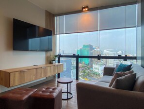 Apartment, 2 Bedrooms (1301) | Living area | TV