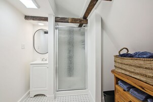 Woodstock Suite 2nd Floor | Bathroom | Designer toiletries, hair dryer, towels, soap