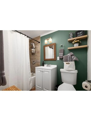 Hair dryer, towels, soap, toilet paper