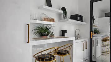 Fridge, microwave, stovetop, coffee/tea maker
