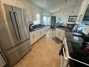 Fridge, microwave, oven, stovetop - 8th Fairway, Private Pool Villa, Southern Dunes (Haines City)