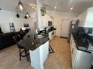 Fridge, microwave, oven, stovetop - 8th Fairway, Private Pool Villa, Southern Dunes (Haines City)