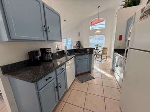 Fridge, microwave, oven, stovetop - Southern Dunes Villa - Private Pool area (Haines City)