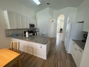 Fridge, microwave, oven, stovetop - Updated Pool Villa - Southern Dunes (Haines City)