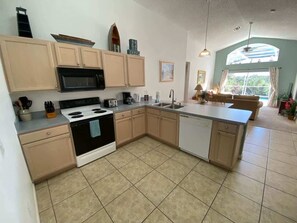 Fridge, microwave, oven, stovetop - Golf Course Views, South Facing Pool Villa (Haines City)