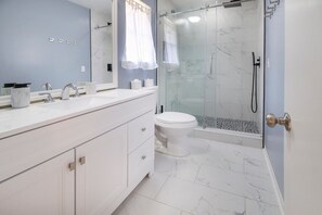 Eco-friendly toiletries, hair dryer, towels, soap