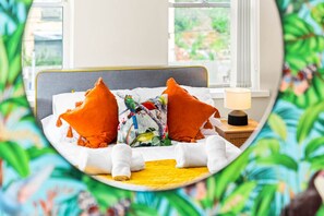 1 bedroom, desk, iron/ironing board, travel crib