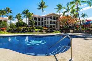 Outdoor pool, open 7:00 AM to 10:00 PM, pool umbrellas, pool loungers