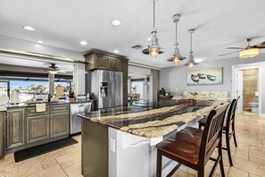 Fridge, microwave, oven, stovetop - Waterfront retreat with heated pool, dog friendly, & picturesque views (Cape Coral)