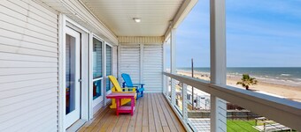 Galveston home with open floor, balcony, patio and water views