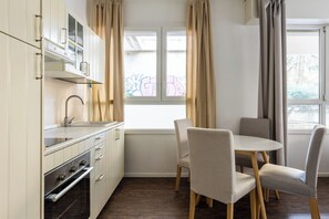 Apartment | Private kitchen | Coffee/tea maker, electric kettle, dining tables - Largo Molina Apartment 1 by Wonderful Italy (Bologna)