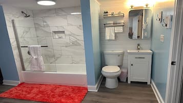 Hair dryer, towels, soap, toilet paper