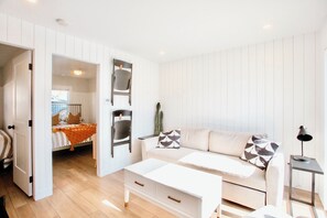 Classic Cabin 10 - 2 Queen Bedrooms + 2 Single and Sofa Bed, 1 Bathroom, Kitchen & Beachfront Views | Living room - Peachland Beach Resort (Peachland)