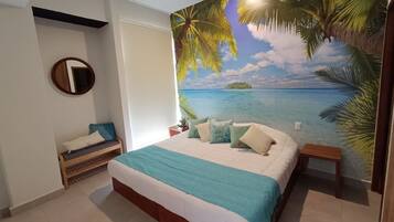 2 habitaciones, tabla de planchar con plancha y ropa de cama