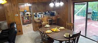 Quiet cabin in the woods w/ access to pools, river, & lakes in gated community!!