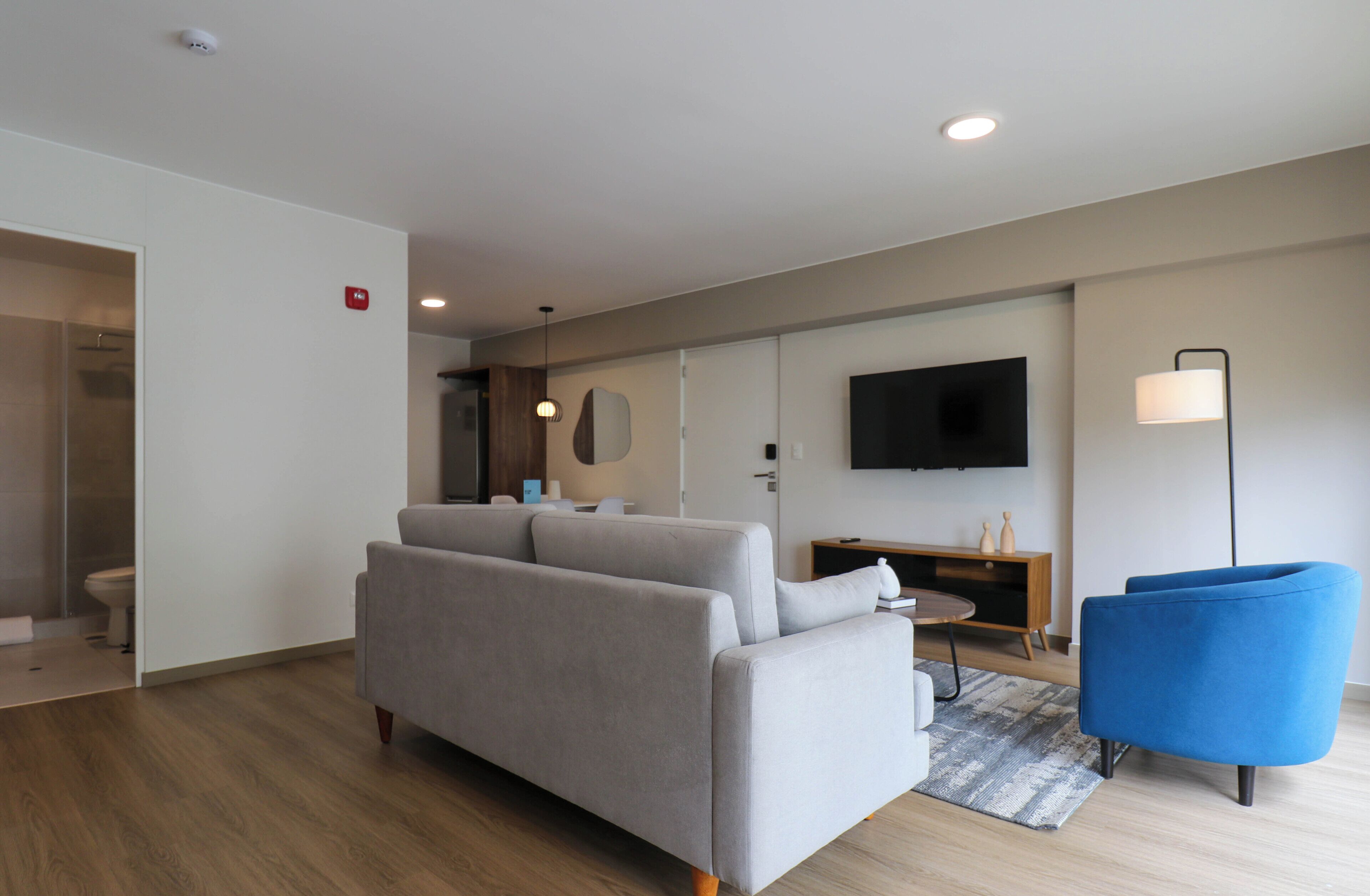 Apartment (605) | Living area | 40-inch Smart TV with cable channels