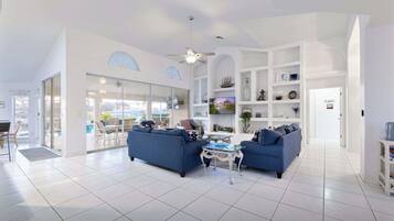 TV, livros, escritórios