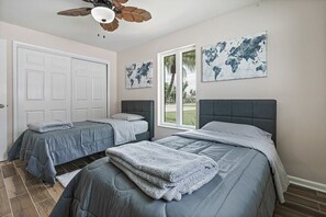 4 bedrooms, iron/ironing board, travel cot, WiFi